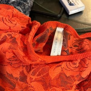 Color story orange lace top size small, no holes or runs